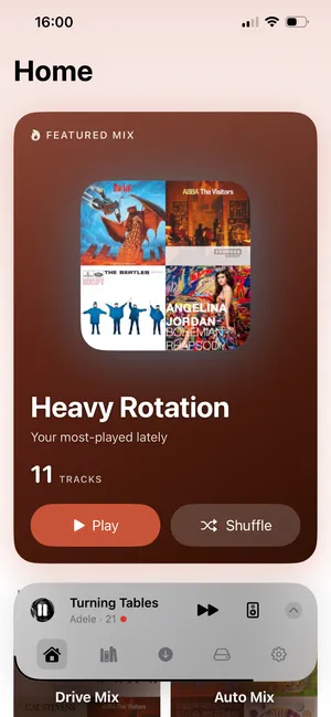 1-bit's Home screen with a featured mix, “Heavy Rotation”, over a collage of four album covers