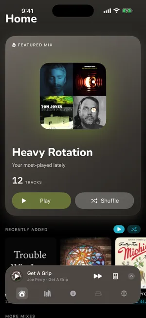 1-bit's Home screen with a featured mix, “Heavy Rotation”, over a collage of four album covers