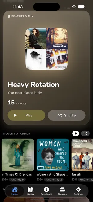 1-bit's Home screen with a featured mix, “Heavy Rotation”, over a collage of four album covers, and a Recently Added row