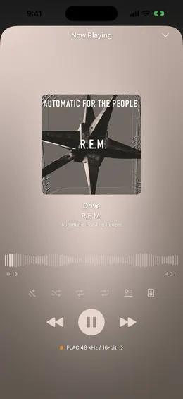 1-bit's Now Playing screen on iPhone with album art, a waveform, and a sample-rate badge