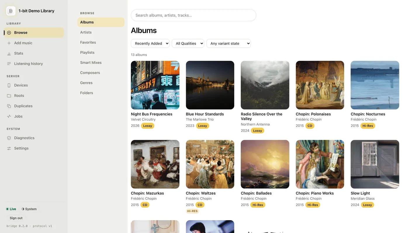 The 1-bit bridge console's Browse view — a sidebar with Library, Server and System groups, a Browse rail (Albums, Artists, Favorites, Playlists, Smart Mixes, Composers, Genres, Folders), a search box, sort / quality / variant-state filters, and an album grid where each tile carries cover art, artist, year and a quality badge.