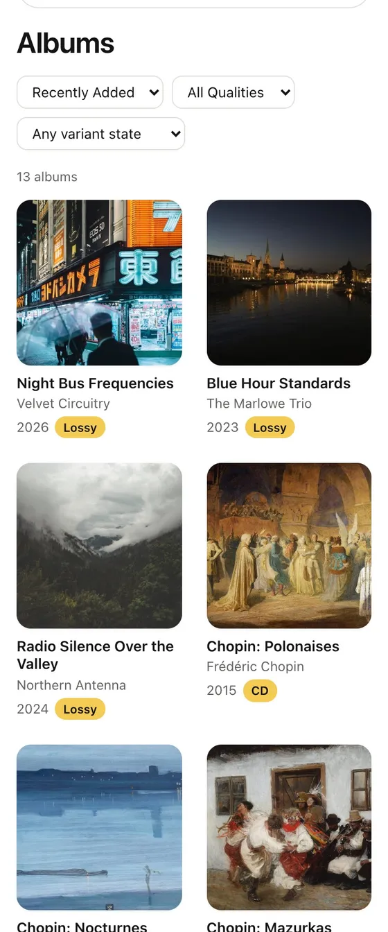 The 1-bit bridge console at phone width — the Albums view of the demo library: sort, quality and variant-state filters, then the album grid two tiles across, each with cover art, year and a quality badge.